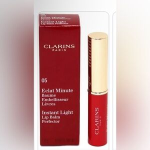 CLARINS INSTANT LIGHT
LIP BALM PERFECTOR 1.8
G/0.06 OZ.